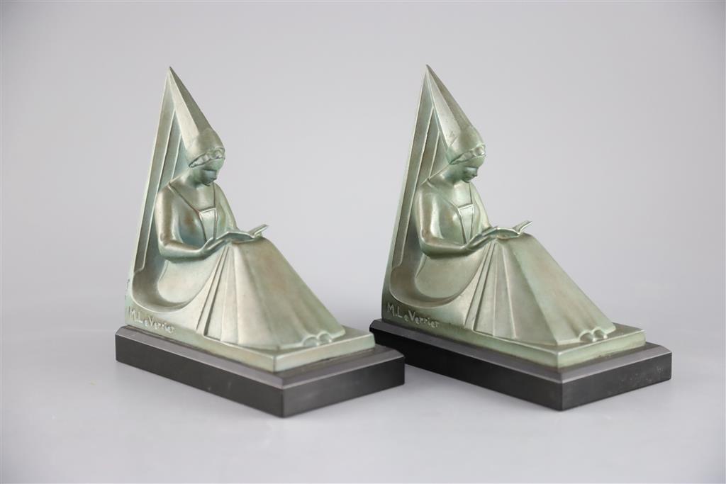 Max le Verrier. A pair of Art Deco patinated bronze bookends, height 6.75in.
